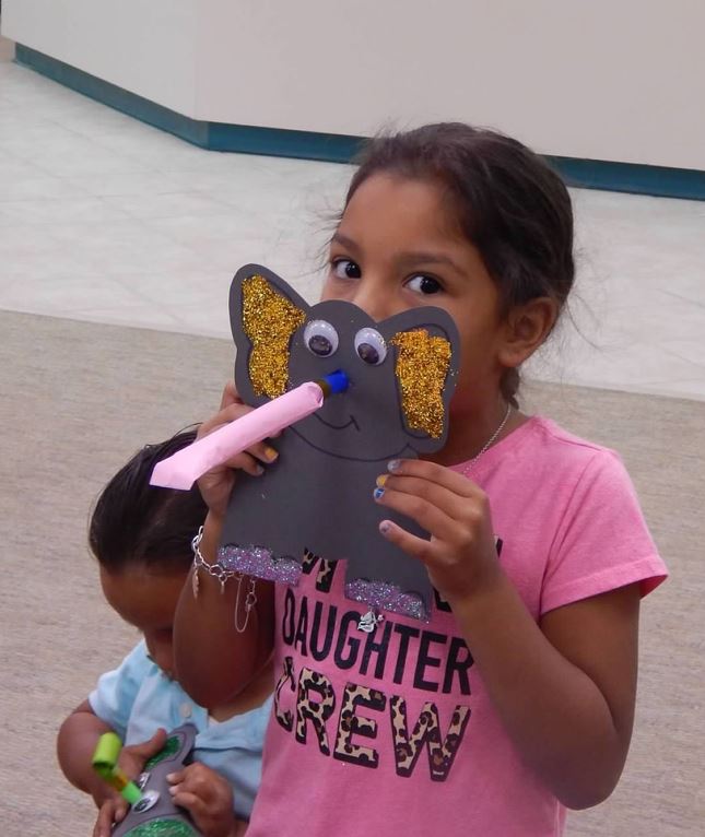 Girl enjoying Craft Day at Anahuac